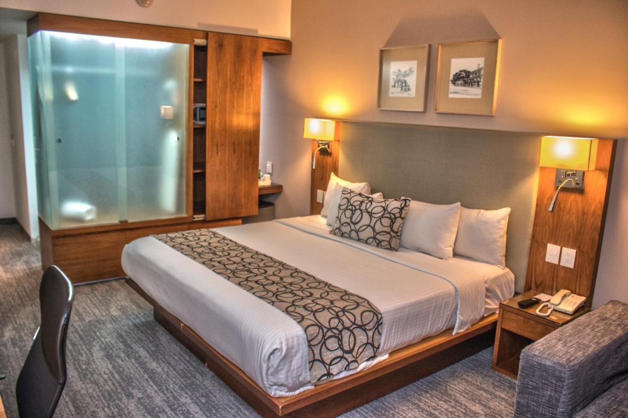 Casa Inn Premium Hotel Queretaro Miranda Zewnętrze zdjęcie A room at the hotel